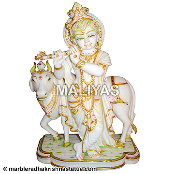 Krishna with cow marble statue
